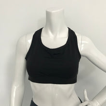 770 Runway black swim bra are quality and fashionable "sports bra style" made for swimming and worn under our rashguards tops.  Italian lycra. Made in Canada.