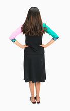770 runway back of BLACK KRYSTLE top, one green sleeve and one light pink sleeve with flower print cuffs