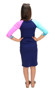 770 runway back NAVY KRYSTLE top, one aqua sleeve and one fusia sleeve with flower print cuffs